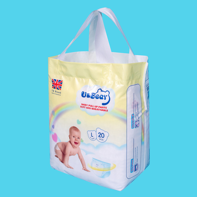 De witte ADL-Baby trekt Broek uit het Super Organische Absorptievermogen Gedrukte Luiers uittrekt